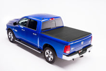 Load image into Gallery viewer, BAK INDUSTRIES 448207 BAKFlip MX4 09-  Dodge Ram 5ft 7in Bed Tonneau